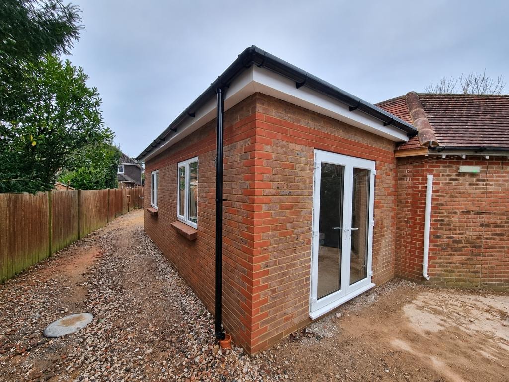Abbey Dean Care Home extension brick build with French doors